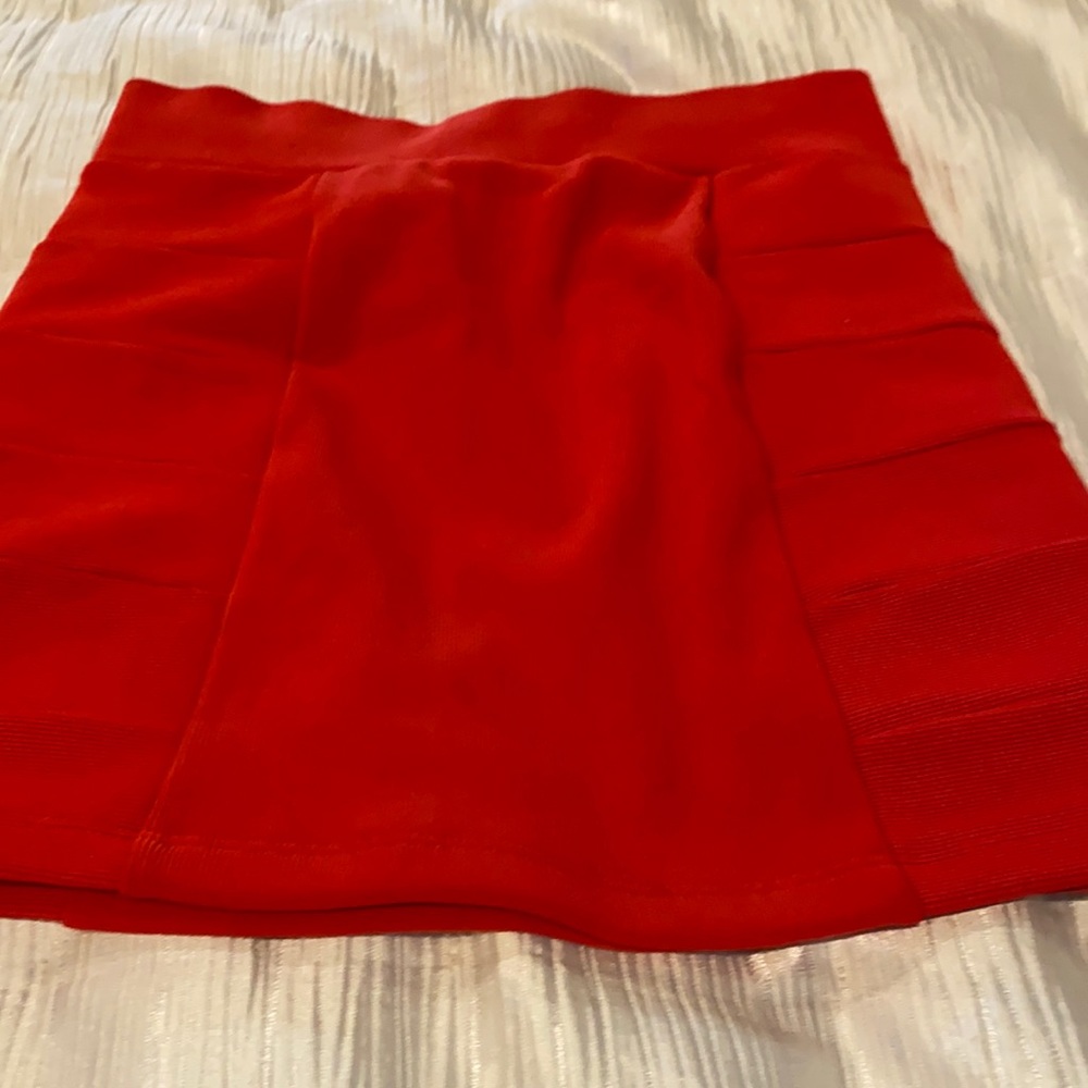 Divided Size 4 , orange skirt
